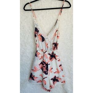 Floral Romper! It’s too short for me so I’m looking to get rid of it.